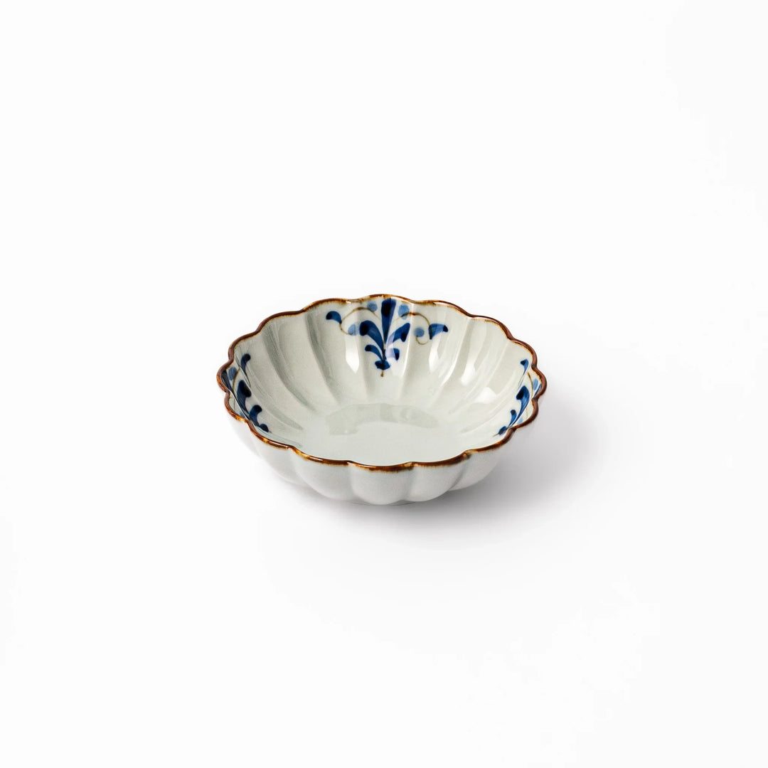 Arita porcelain octagonal cereal bowl with blue floral leaf pattern and gold rim, ideal for rice or soup.