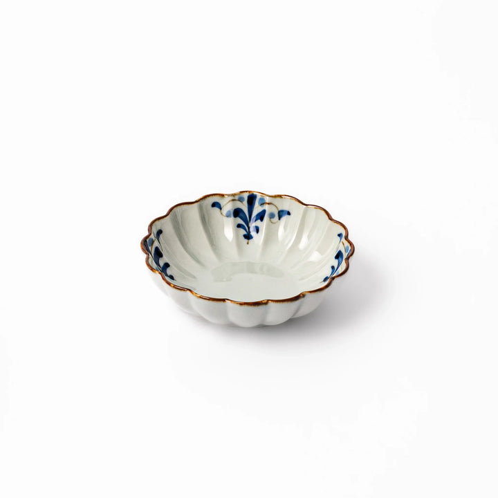 Arita porcelain octagonal cereal bowl with blue floral leaf pattern and gold rim, ideal for rice or soup.