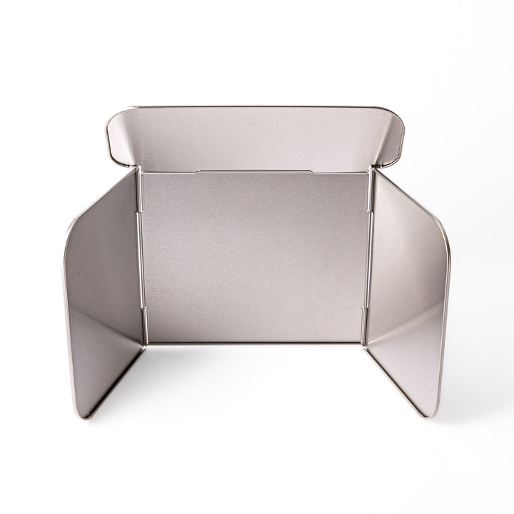 Japanese Foldable Stainless Steel Stove Splatter Guard fully assembled and standing on a white background