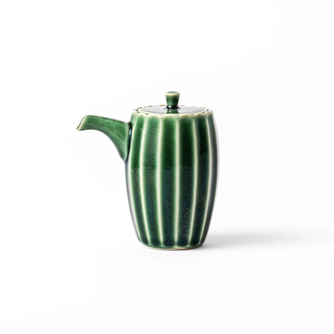 Mino ware soy sauce dispenser with forest-green glaze and drip-free spout, blending beauty and function.