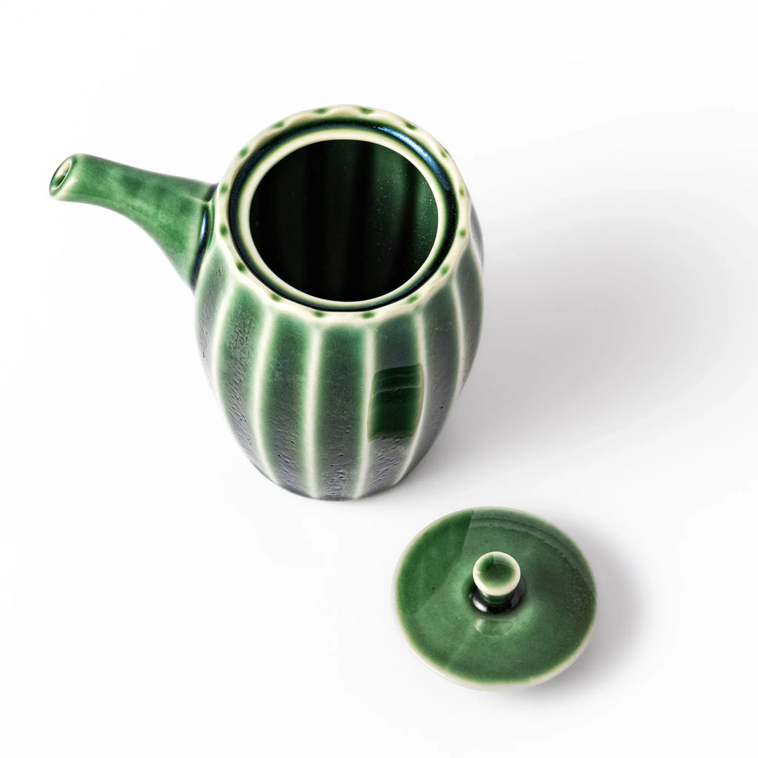 Mino ware soy sauce dispenser with forest-green glaze and drip-free spout, blending beauty and function.