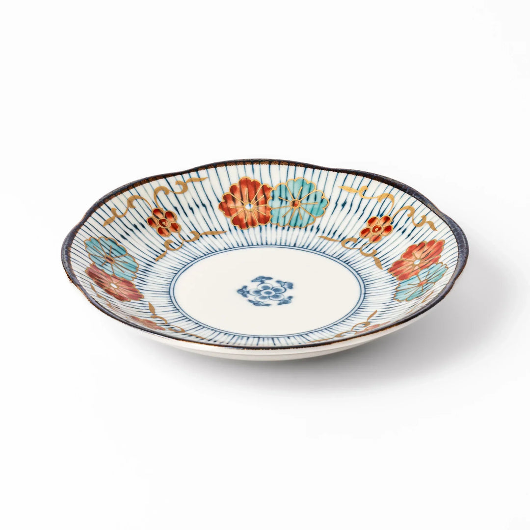 Scalloped Japanese dessert plate with blue stripes red teal and gold floral motifs perfect for small treats.