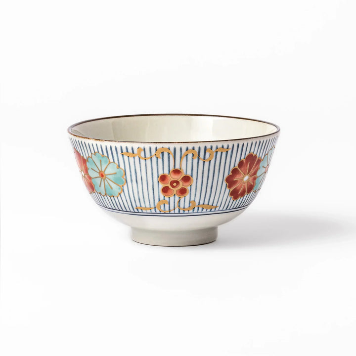 Traditional Japanese rice bowl with blue stripes and red teal and gold floral motifs perfect for bright everyday meals.