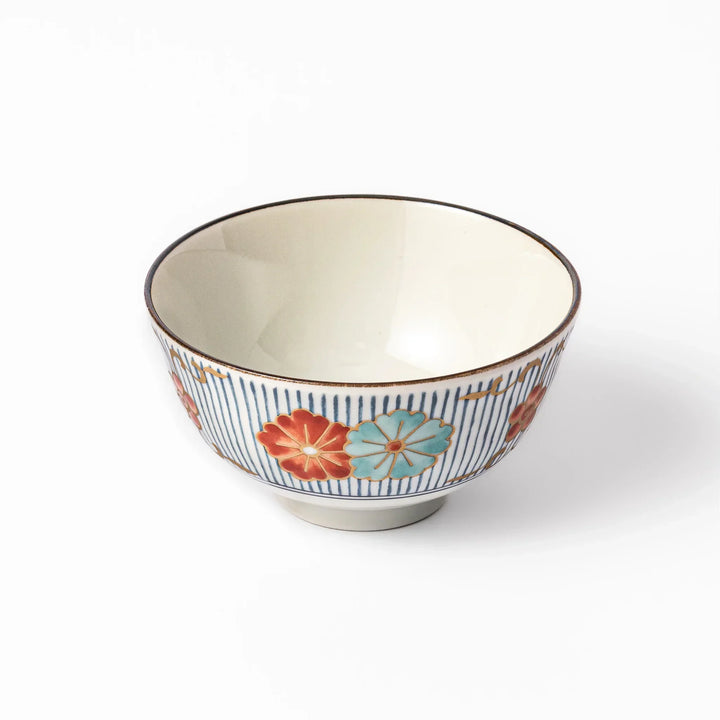 Traditional Japanese rice bowl with blue stripes and red teal and gold floral motifs perfect for bright everyday meals.