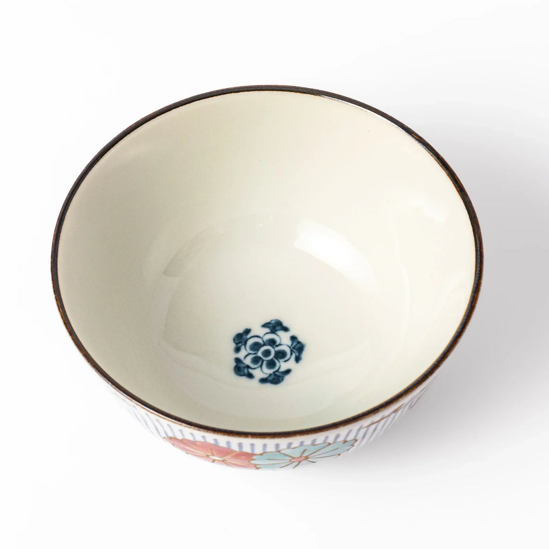 Traditional Japanese rice bowl with blue stripes and red teal and gold floral motifs perfect for bright everyday meals.