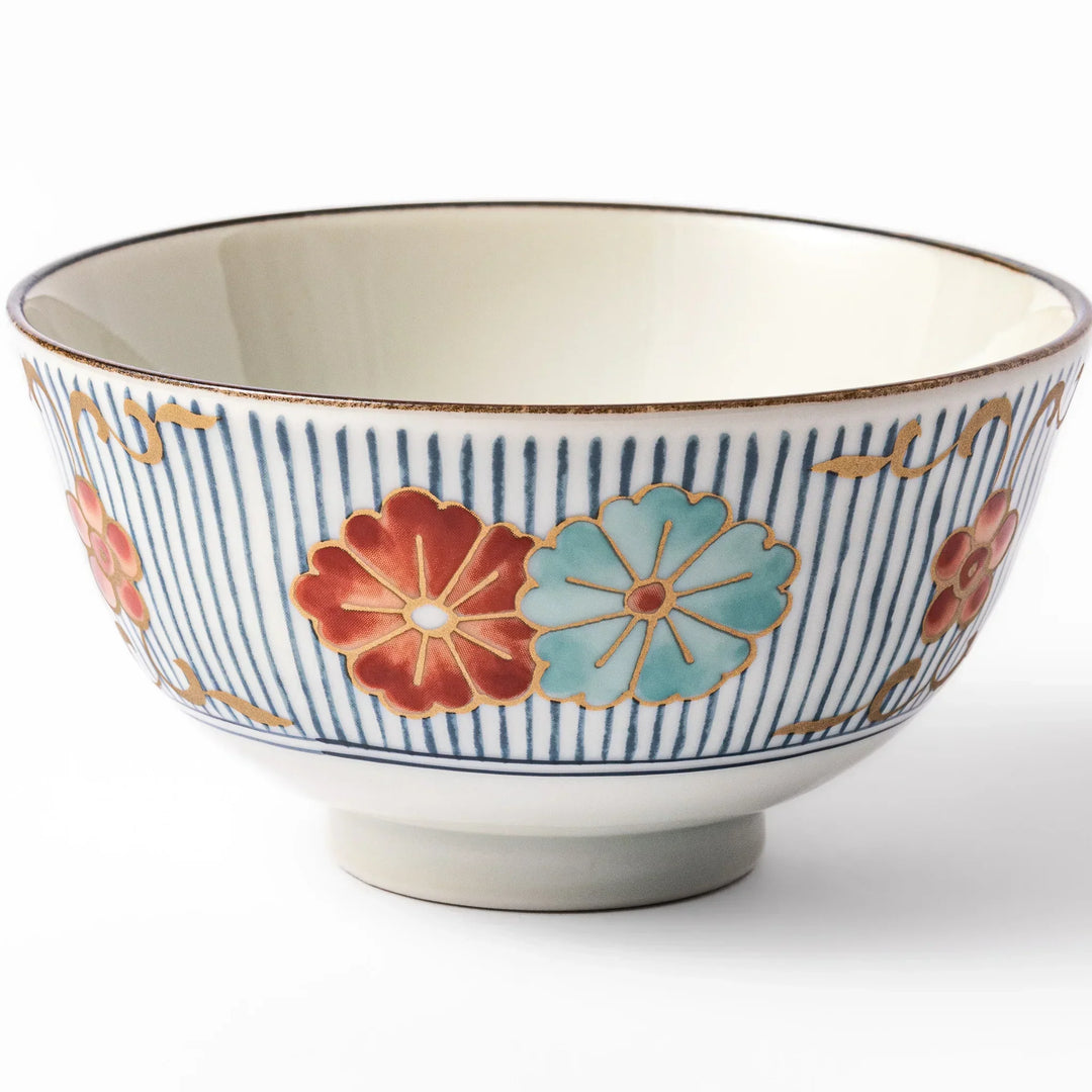 Traditional Japanese rice bowl with blue stripes and red teal and gold floral motifs perfect for bright everyday meals.