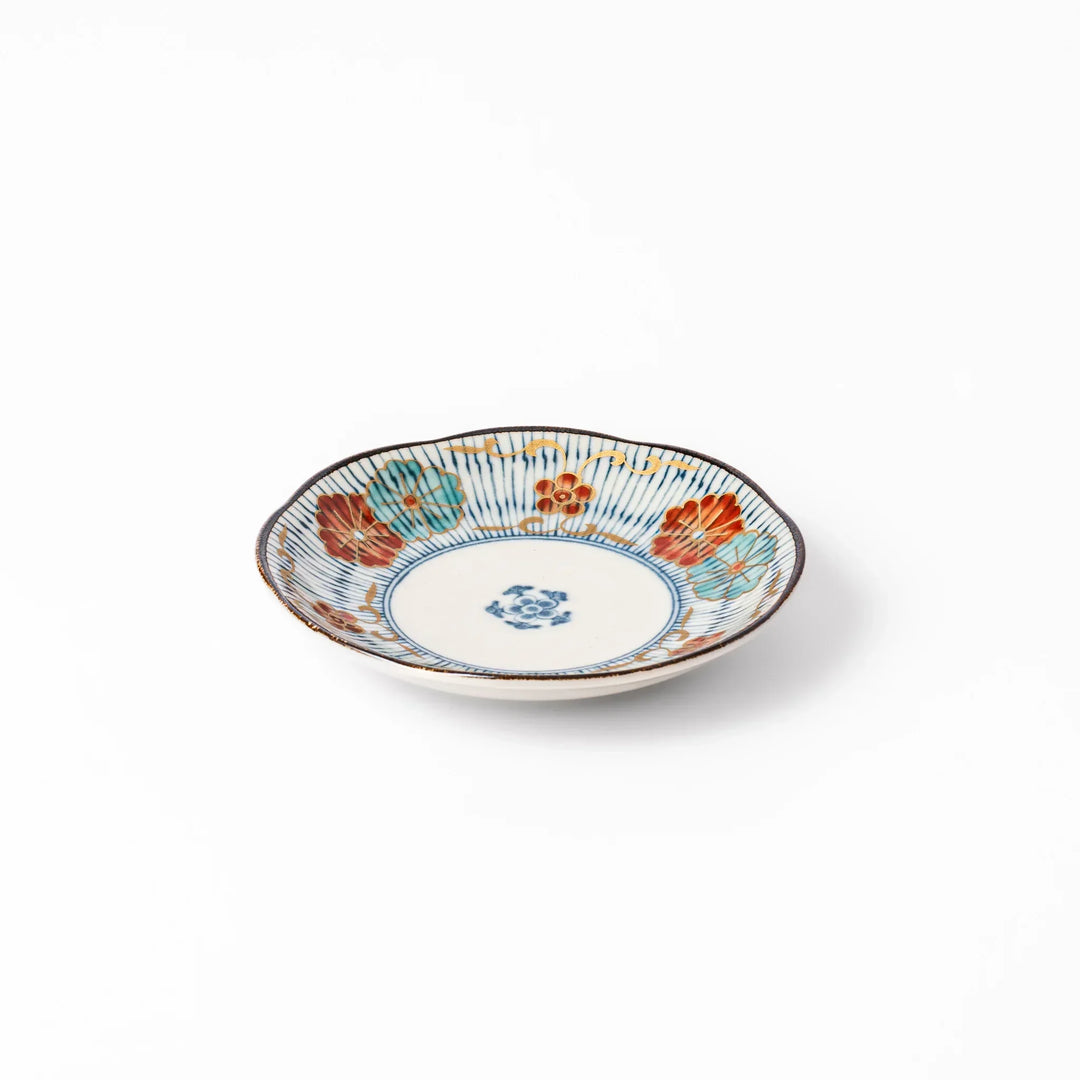 Scalloped Japanese sauce dish with blue stripes and red teal and gold motifs perfect for serving condiments.