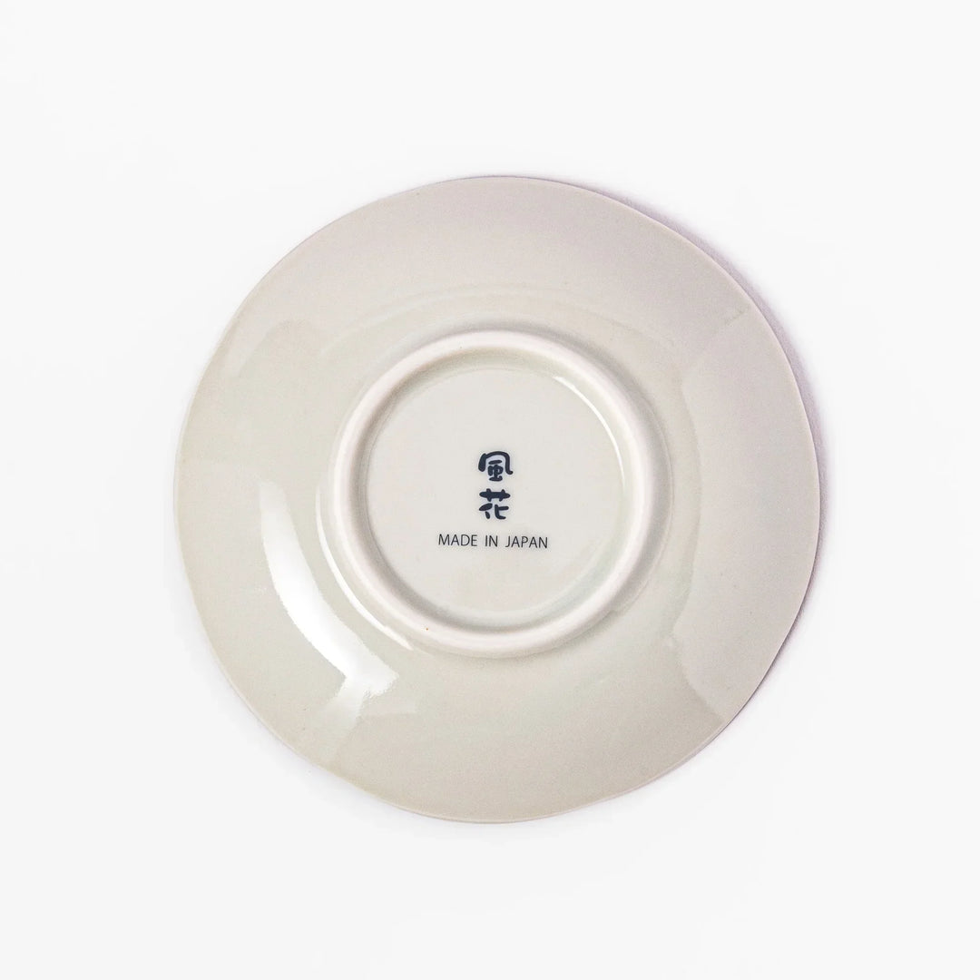 Scalloped Japanese sauce dish with blue stripes and red teal and gold motifs perfect for serving condiments.