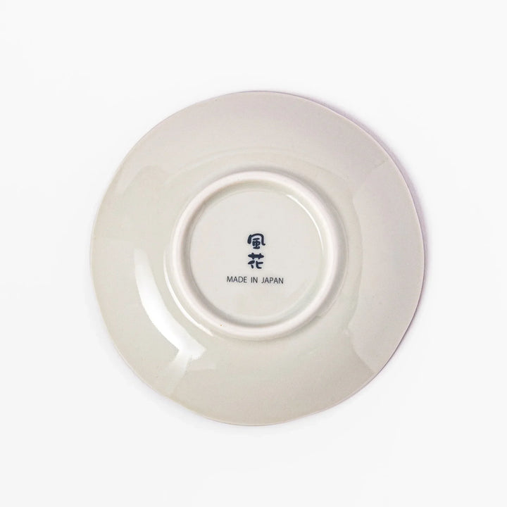 Scalloped Japanese sauce dish with blue stripes and red teal and gold motifs perfect for serving condiments.