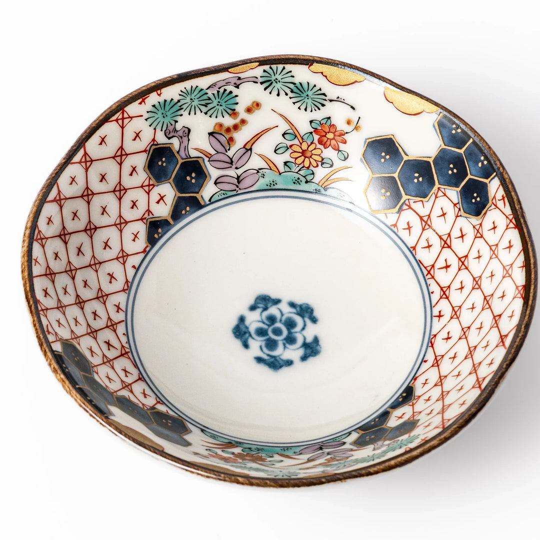 Scalloped Japanese dessert bowl with red lattice navy hexagon and floral designs ideal for sweets or sides.