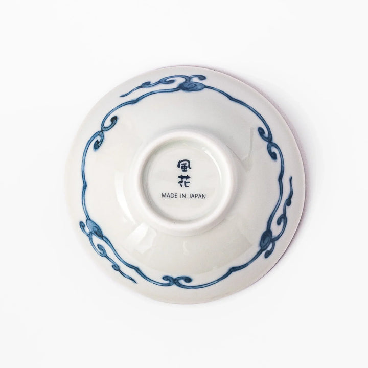 Scalloped Japanese dessert bowl with red lattice navy hexagon and floral designs ideal for sweets or sides.