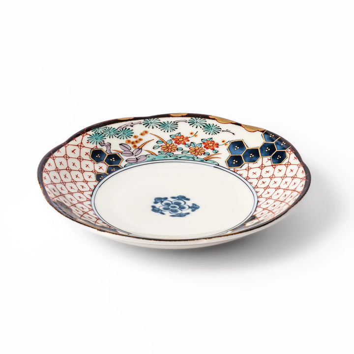 Scalloped Japanese dessert plate with red lattice navy hexagons and floral motifs perfect for elegant dining.
