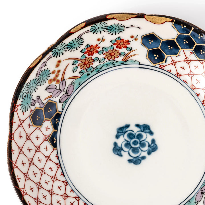Scalloped Japanese dessert plate with red lattice navy hexagons and floral motifs perfect for elegant dining.