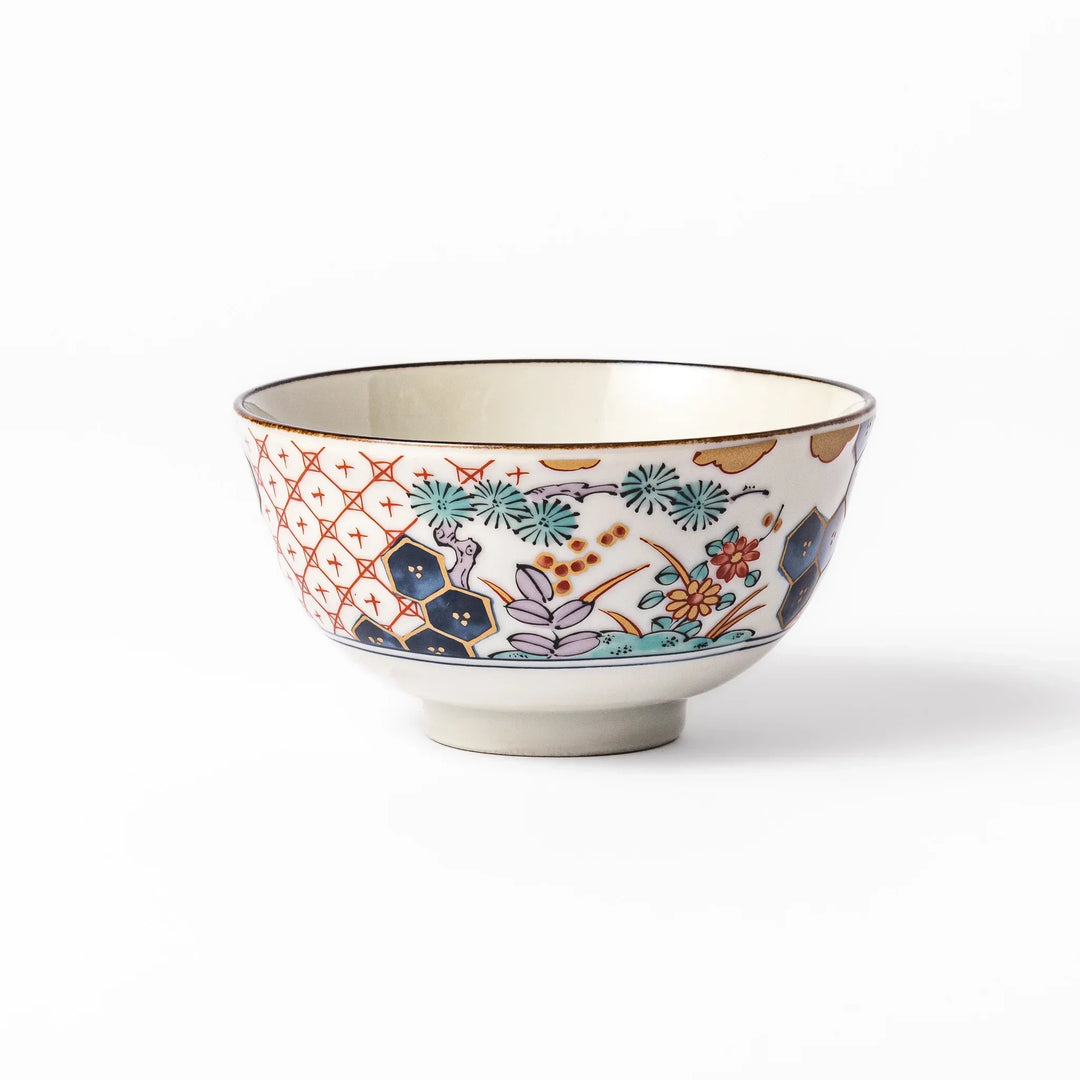 Traditional Japanese rice bowl with red lattice navy hexagons and floral motifs for elegant everyday dining.