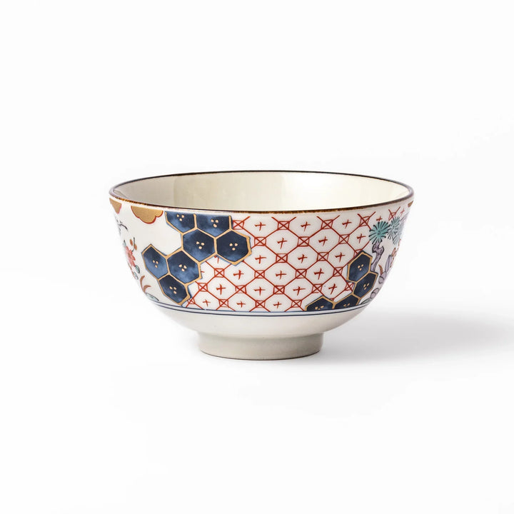 Traditional Japanese rice bowl with red lattice navy hexagons and floral motifs for elegant everyday dining.