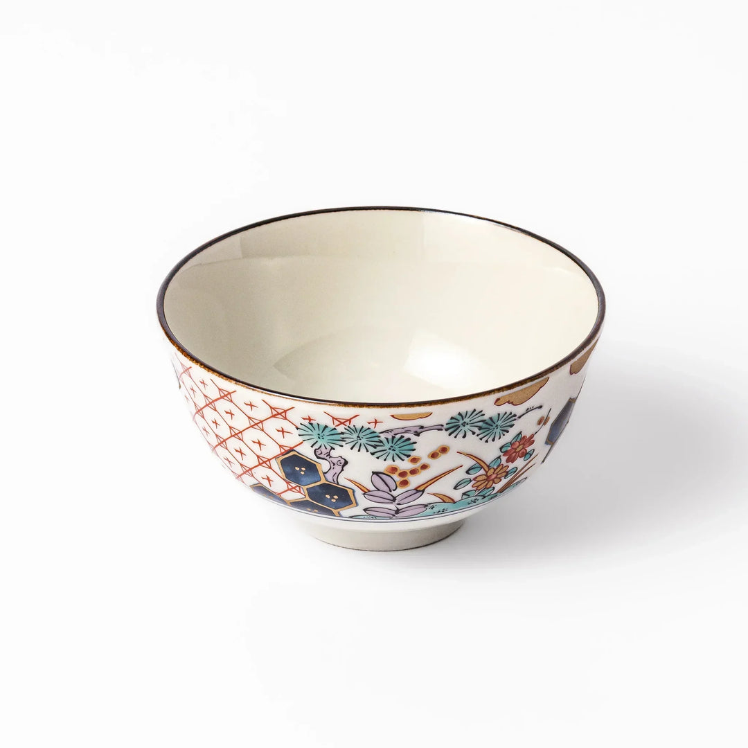 Traditional Japanese rice bowl with red lattice navy hexagons and floral motifs for elegant everyday dining.
