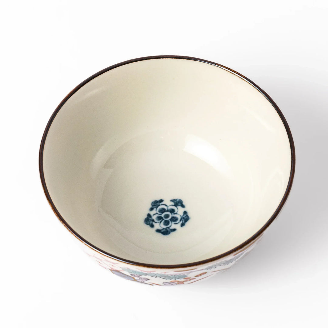 Traditional Japanese rice bowl with red lattice navy hexagons and floral motifs for elegant everyday dining.