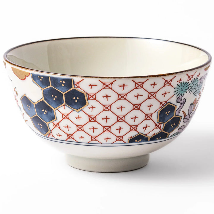 Traditional Japanese rice bowl with red lattice navy hexagons and floral motifs for elegant everyday dining.