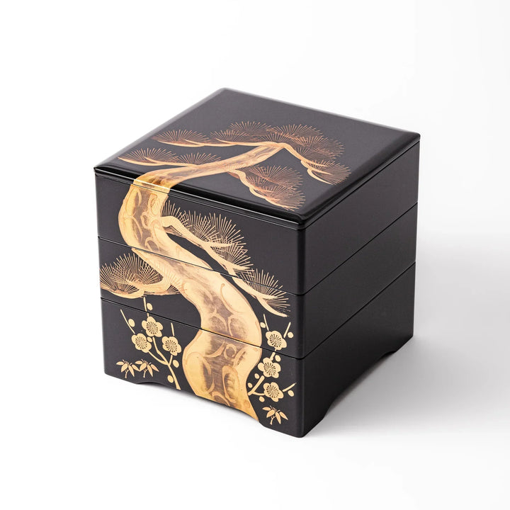 Golden Pine Japanese three tier jubako box with gold pine tree on black lacquer for festive occasions.