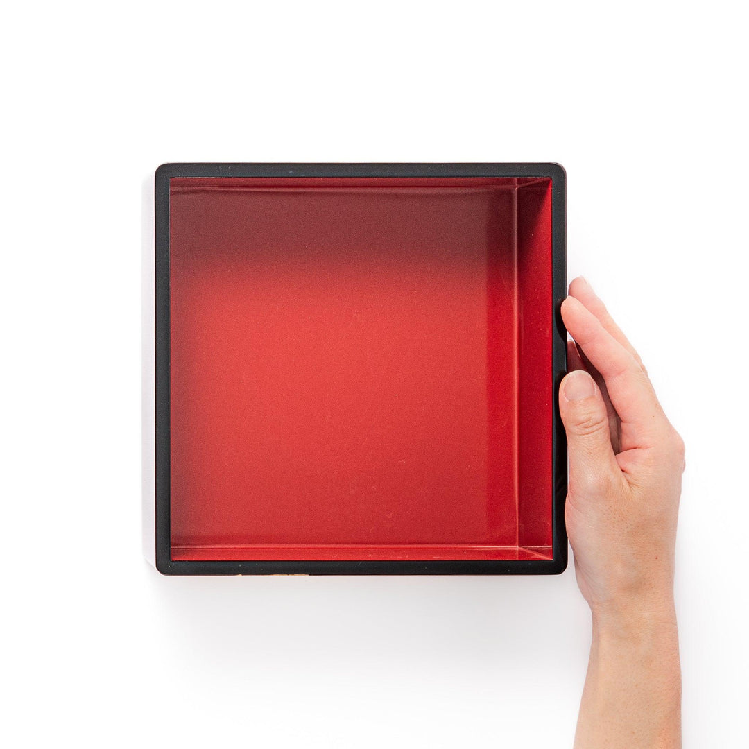 Golden Pine Japanese three tier jubako box with gold pine tree on black lacquer for festive occasions.