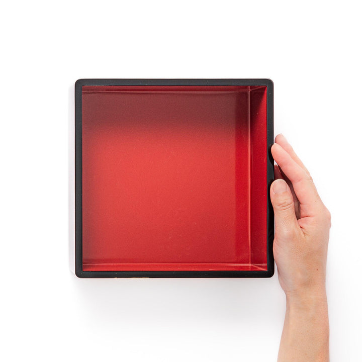 Golden Pine Japanese three tier jubako box with gold pine tree on black lacquer for festive occasions.