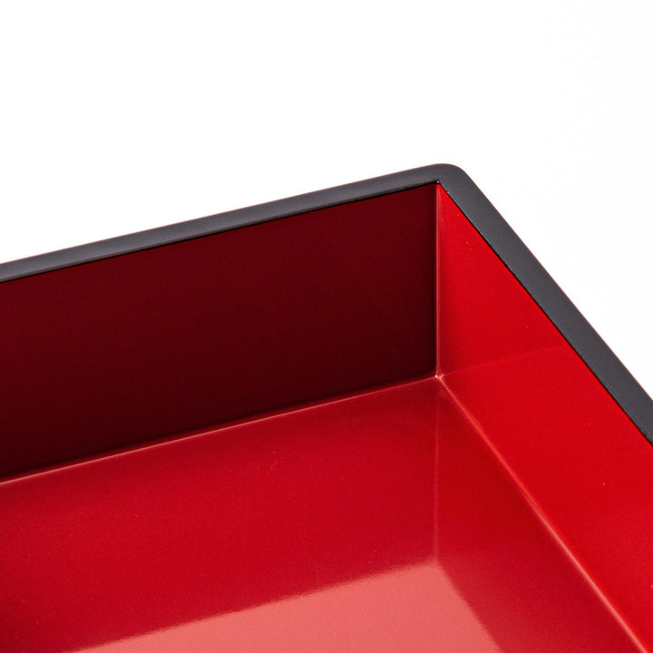 Golden Pine Japanese three tier jubako box with gold pine tree on black lacquer for festive occasions.