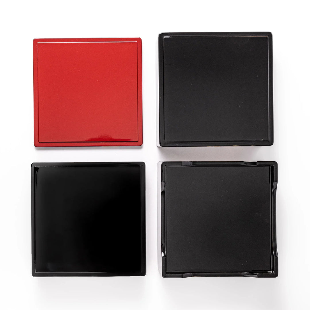 Golden Pine Japanese three tier jubako box with gold pine tree on black lacquer for festive occasions.