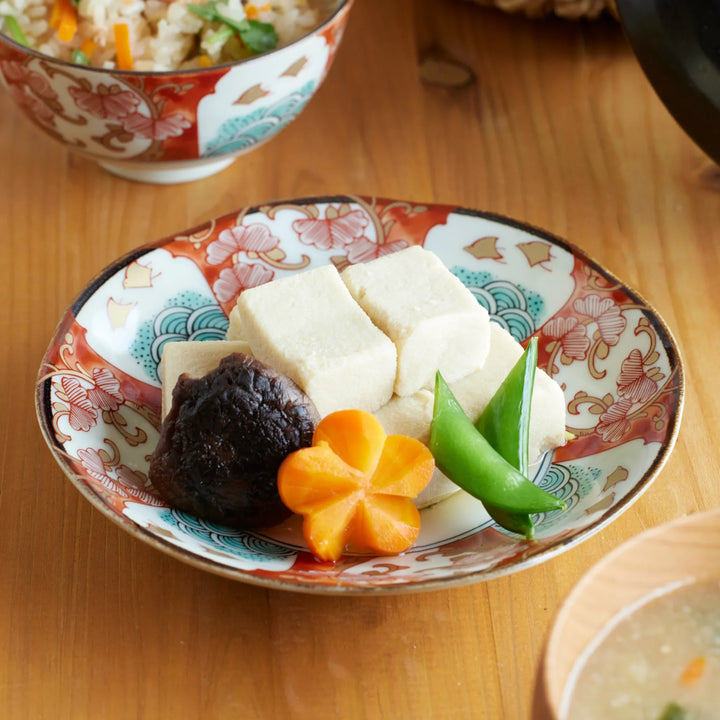 Golden Shorebird Dessert Plate served with tofu mushroom carrot and snow peas for traditional Japanese dining.