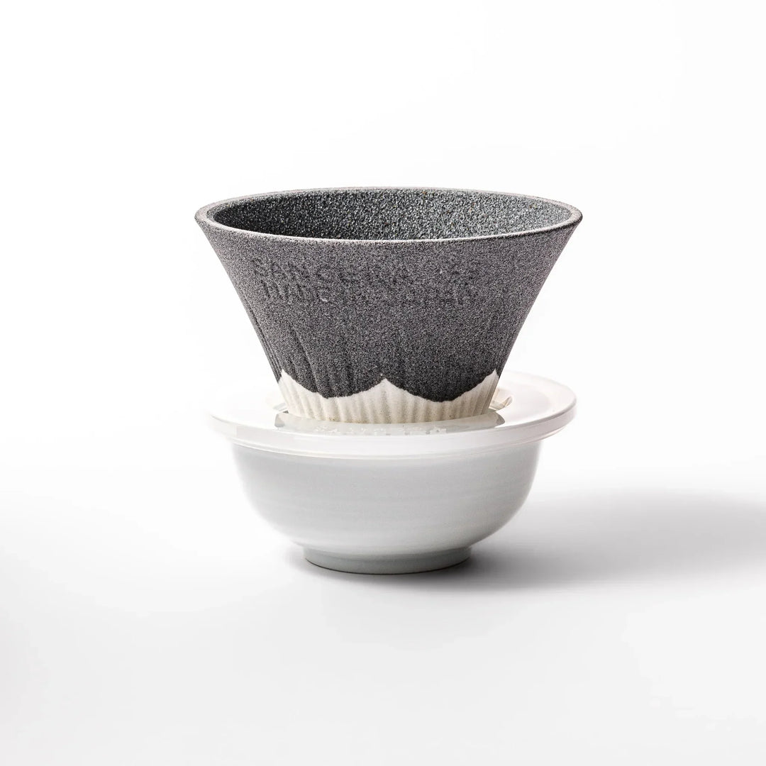 Black Mount Fuji ceramic coffee filter with snowy peak handcrafted in Japan for stylish pour over brewing.