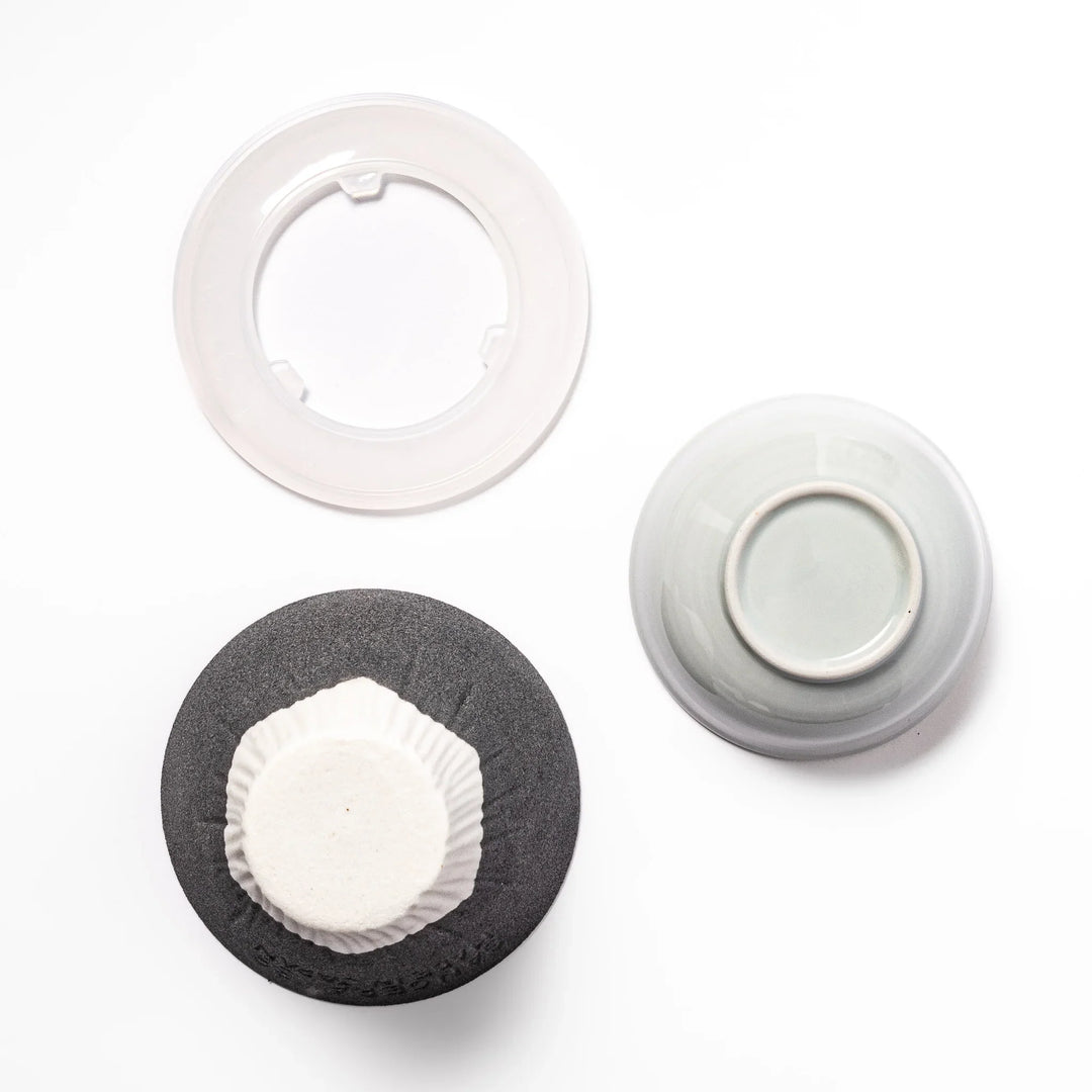 Black Mount Fuji ceramic coffee filter with snowy peak handcrafted in Japan for stylish pour over brewing.