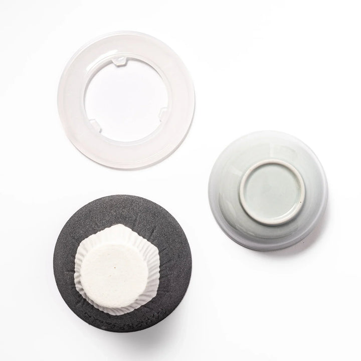 Black Mount Fuji ceramic coffee filter with snowy peak handcrafted in Japan for stylish pour over brewing.