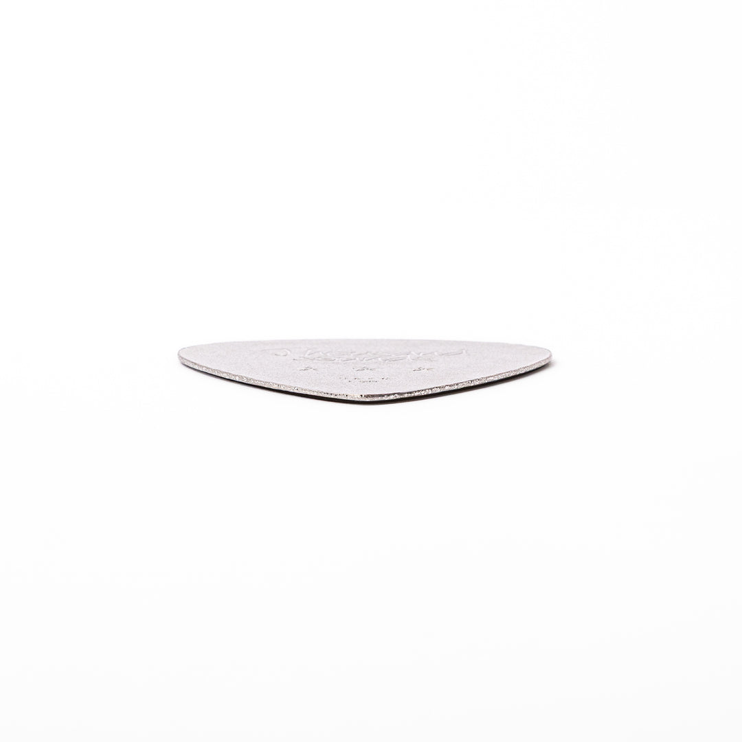 Unique guitar pick shaped metal coaster with sandblasted textured finish engraved with thousand sounds text and stars