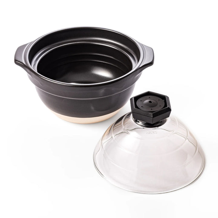 HARIO GohanGama ceramic rice cooker pot with a clear glass lid, designed for traditional Japanese stove top cooking