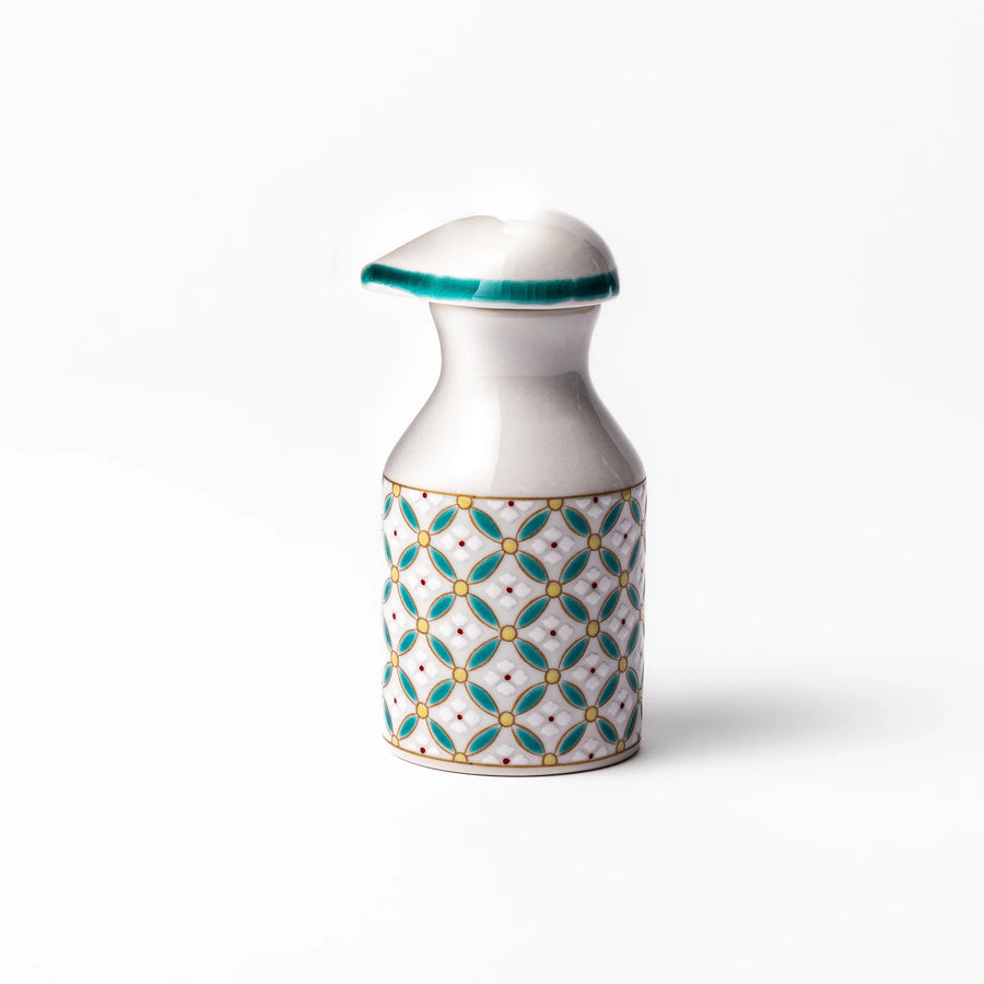 Japanese ceramic soy sauce dispenser with teal geometric blossom pattern in gold and red for refined dining.