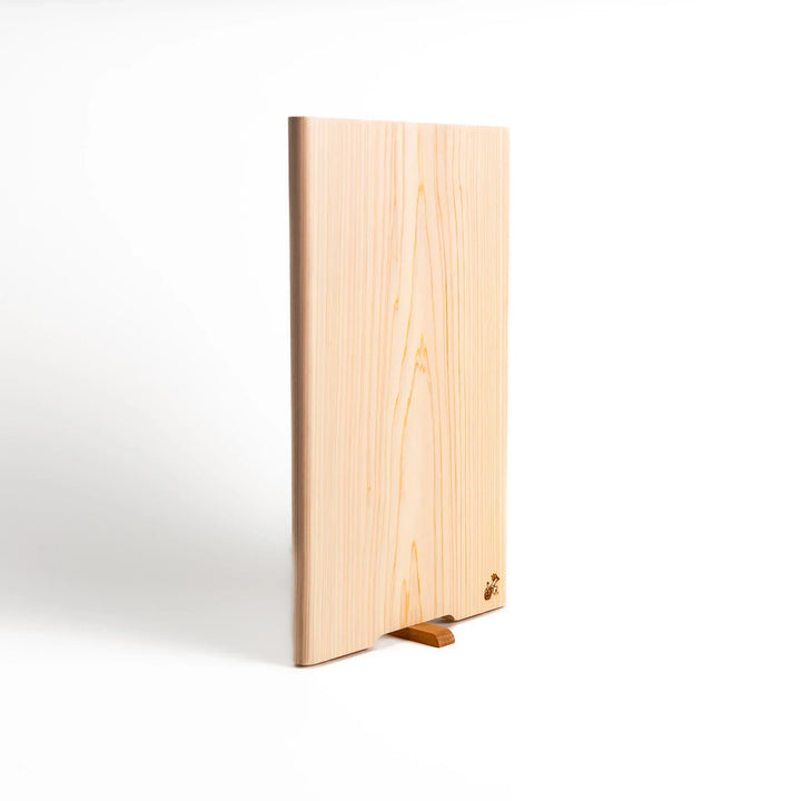 Hinoki wood cutting board with stand and engraved logo showing clean design for stylish food prep.