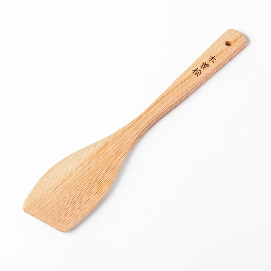 Hinoki Angled Large Wooden Spatula with engraved handle and smooth grain ideal for flipping and serving.