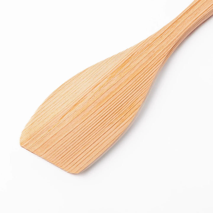 Hinoki Angled Large Wooden Spatula with engraved handle and smooth grain ideal for flipping and serving.