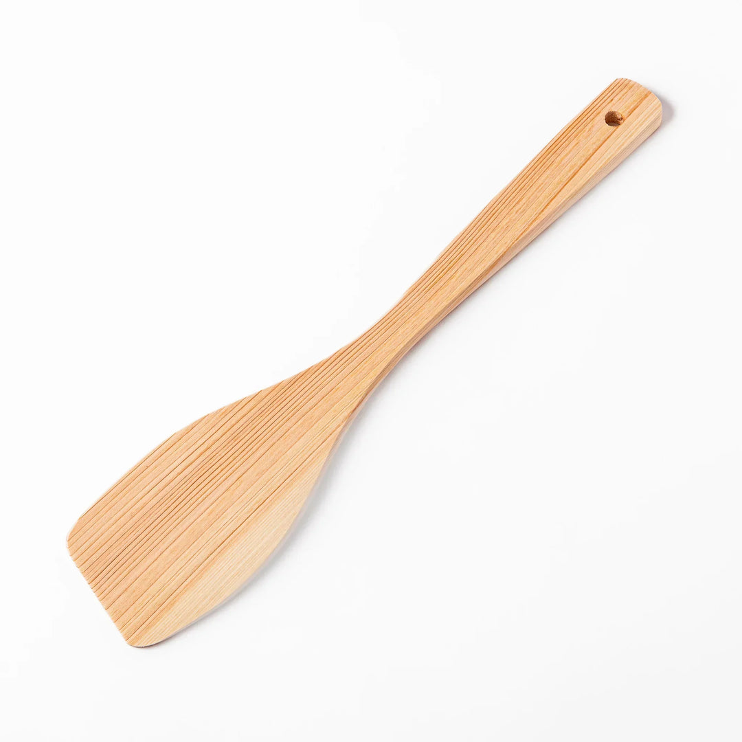 Hinoki Angled Large Wooden Spatula with engraved handle and smooth grain ideal for flipping and serving.