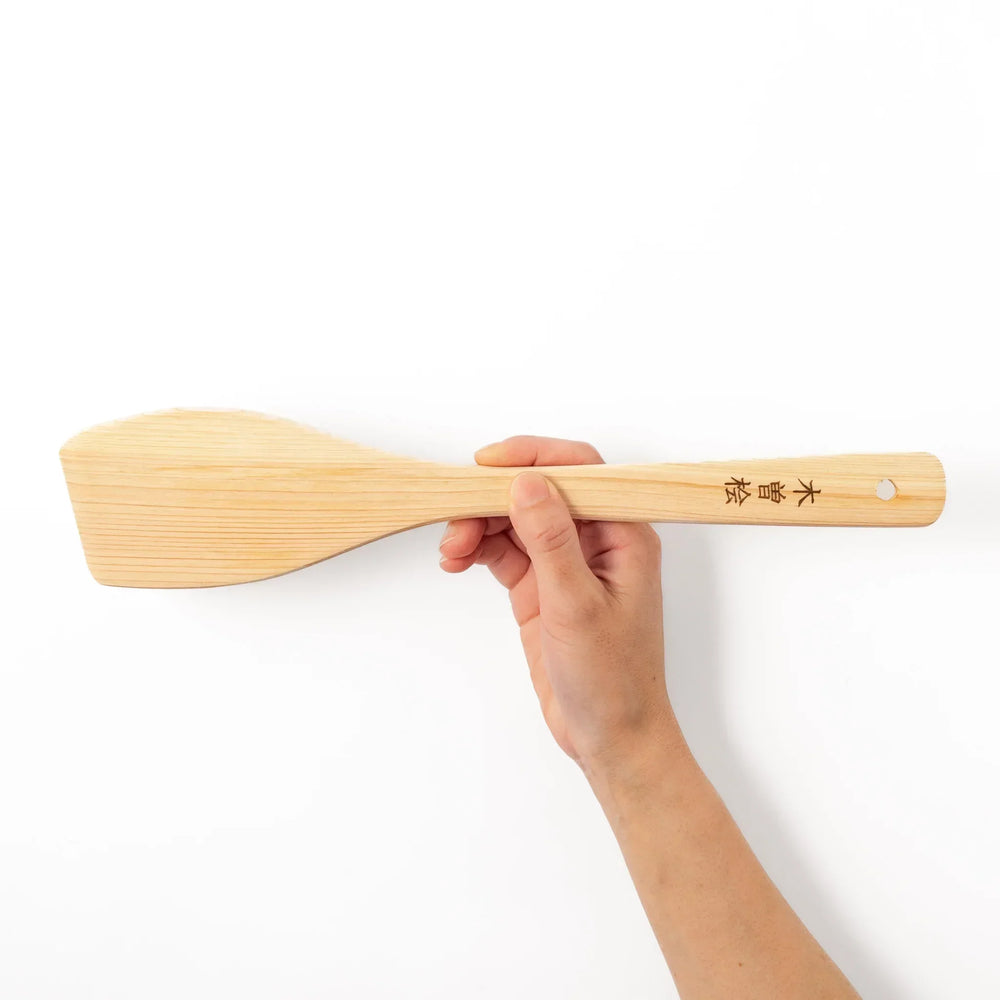 Hinoki Angled Large Wooden Spatula with engraved handle and smooth grain ideal for flipping and serving.