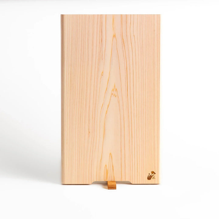 Hinoki wood cutting board with stand and engraved logo showing clean design for stylish food prep.