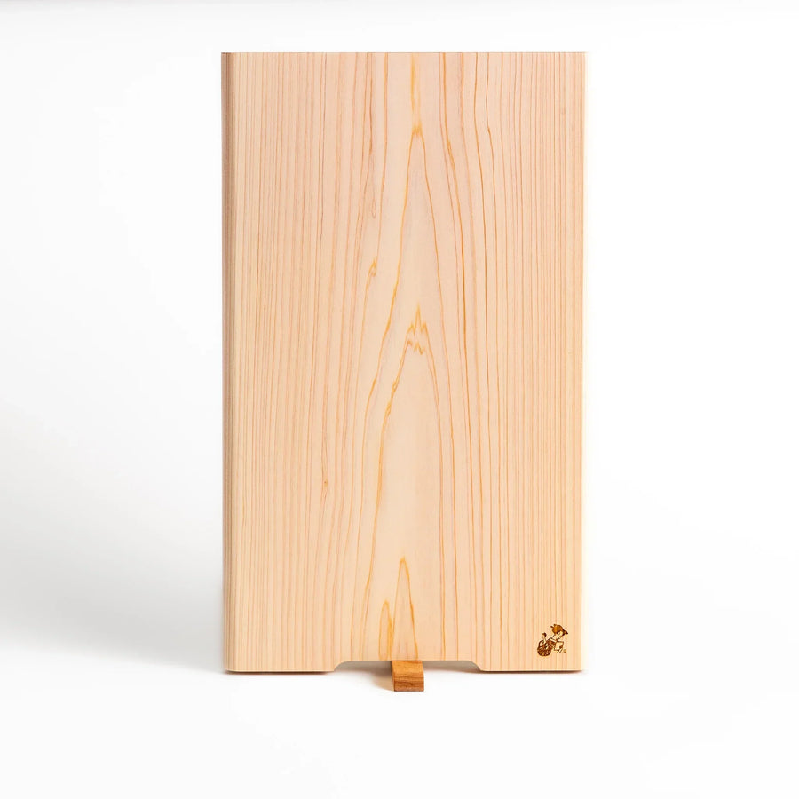 Hinoki wood cutting board with stand and engraved logo showing clean design for stylish food prep.