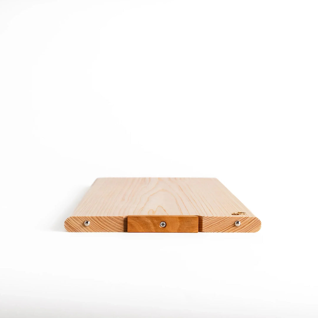 Hinoki wood cutting board with stand and engraved logo showing clean design for stylish food prep.