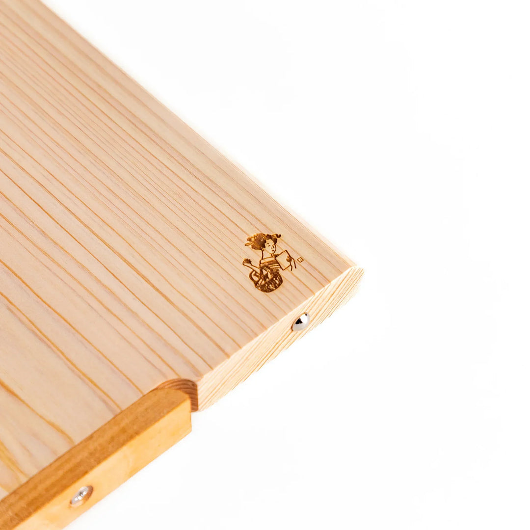 Hinoki wood cutting board with stand and engraved logo showing clean design for stylish food prep.