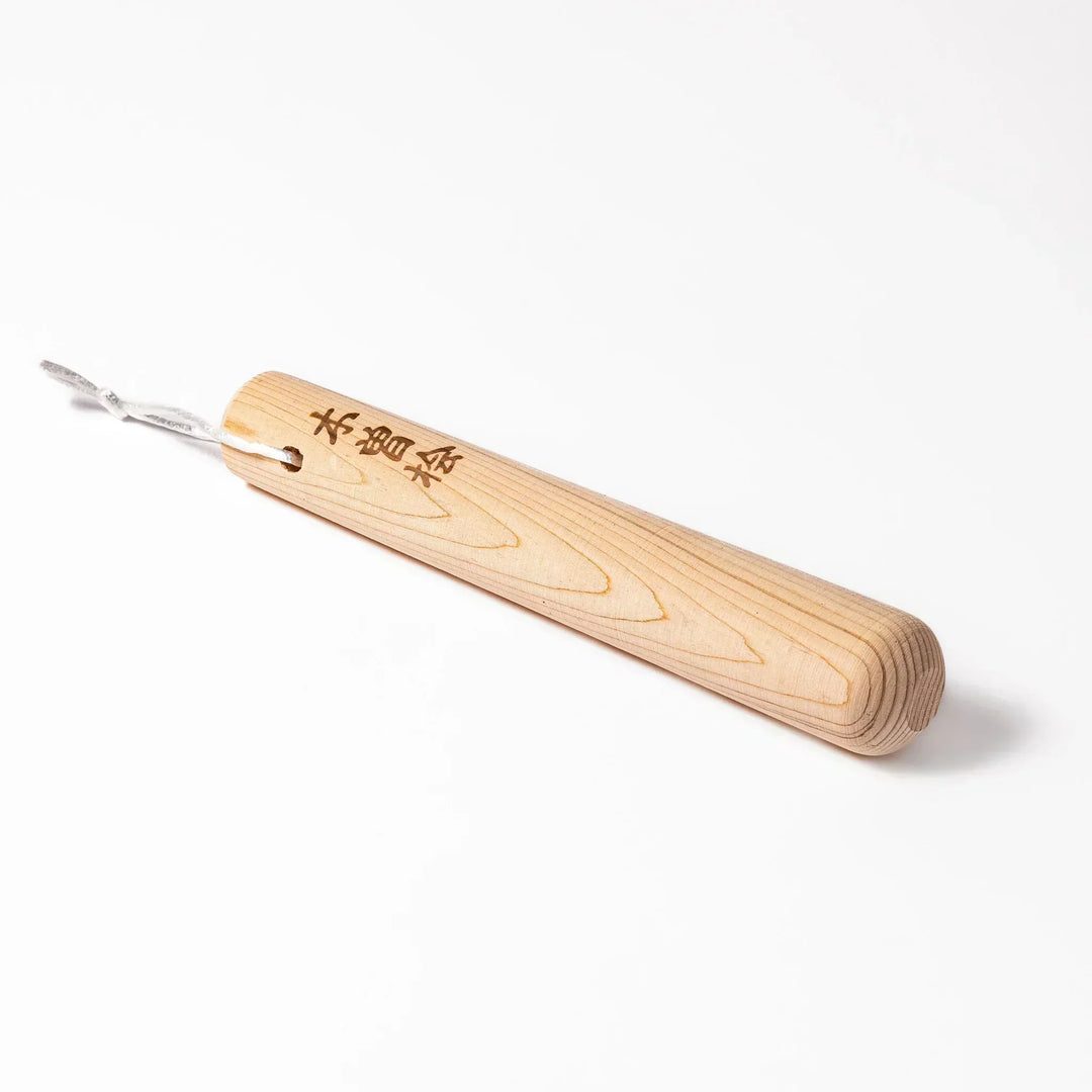 Hinoki wood pestle with engraved Japanese characters and cord for grinding seeds and spices with suribachi.