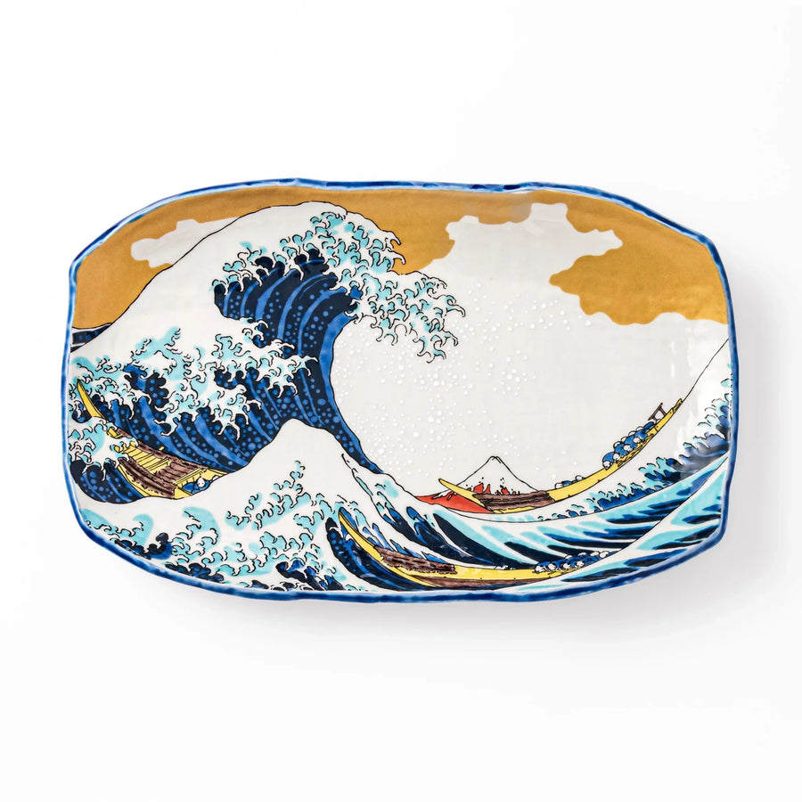 Rectangular Japanese serving plate with Hokusai Great Wave design in vivid blue gold and white for dining.