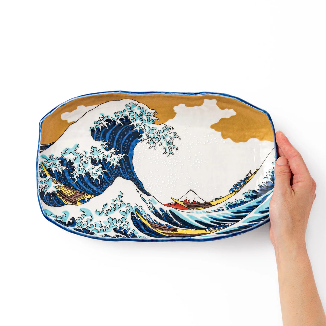 Rectangular Japanese serving plate with Hokusai Great Wave design in vivid blue gold and white for dining.