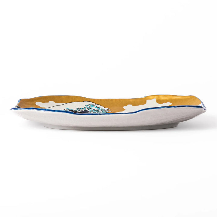 Rectangular Japanese serving plate with Hokusai Great Wave design in vivid blue gold and white for dining.