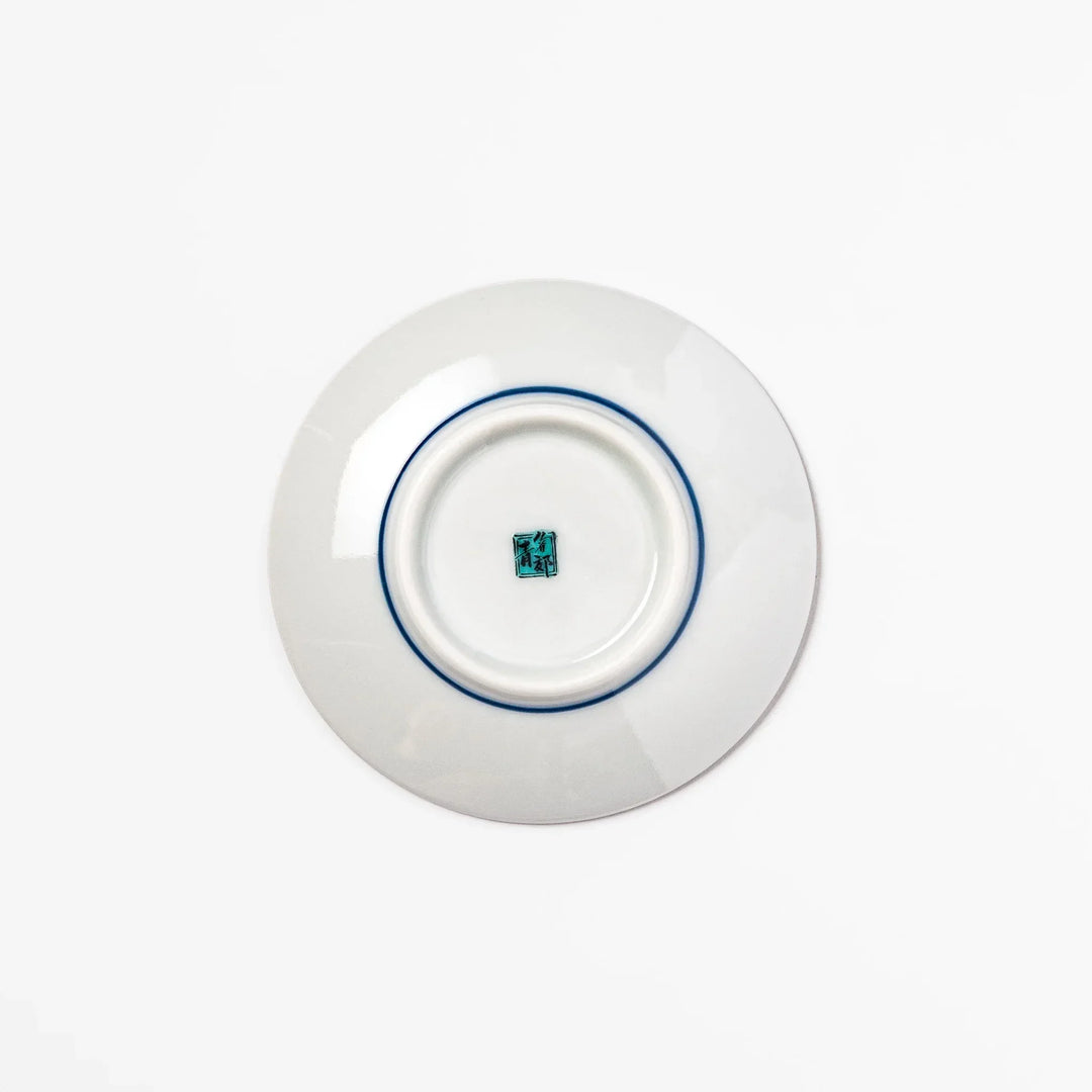 Round Japanese ceramic sauce dish with Hokusai Red Fuji design featuring red mountain blue sky and clouds.