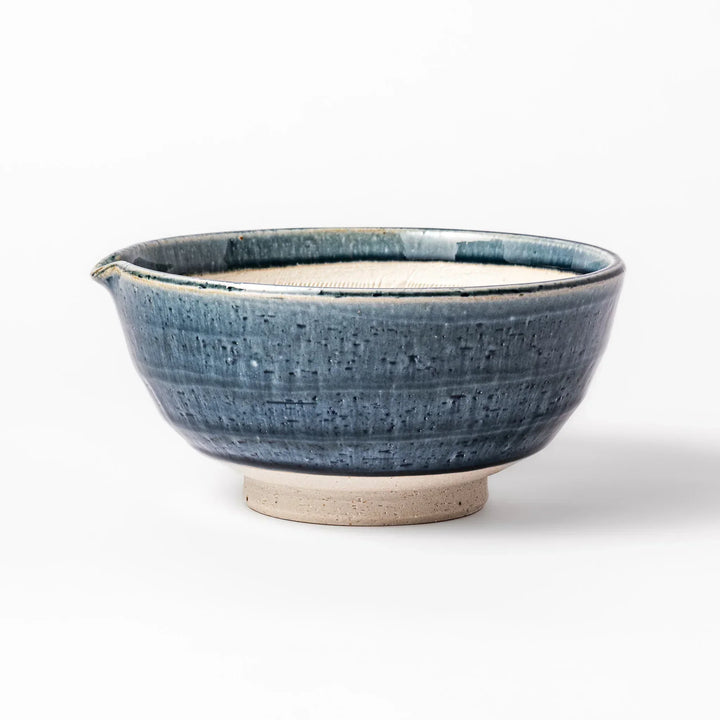 Indigo Japanese suribachi mortar with cream grooved interior and spout for grinding sesame herbs and spices.