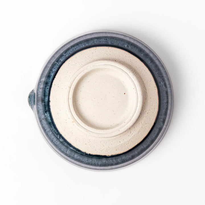 Indigo Japanese suribachi mortar with cream grooved interior and spout for grinding sesame herbs and spices.